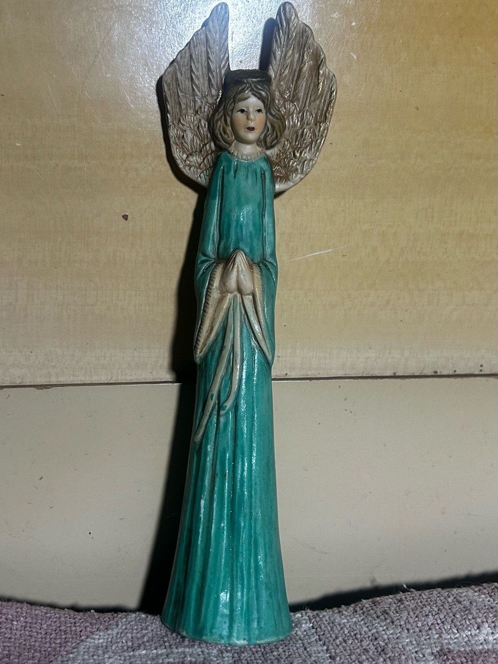 Tall, Thin Ceramic Christmas Angel In a Green Robe with a Textured Matte Finish